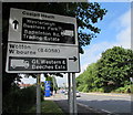 Black and white directions sign facing Badminton Road, Yate in BS37 5NS