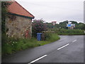 Road junction and pillar box in KY10 2RW
