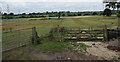 Two gates and a stile opposite Nibley Lane, South Gloucestershire in BS36 2NS