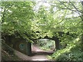 Road over former railway [1] in SN8 3LG