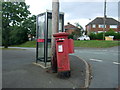 George VI postbox and telephone box on Groveley Lane in B31 4TD