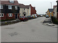 Looking northeast along Wiltshire Gardens in TN25 7FU