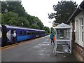 Train and platform at Pollokshaws West station in G43 1BG