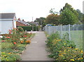 Path alongside school playing field in IP6 0AS