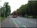 Bus stop and shelter on the A104, Woodford Green in IG8 0QF