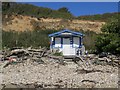 Beach cabin and driftwood, Forelands, Bembridge in PO35 5PG