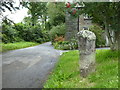 Ancient cross beside the road at Blisland in PL30 4JE