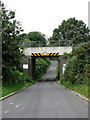 Railway bridge crossing Stonehouse Road in NR13 6EZ