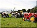 Display of vintage Massey Ferguson tractors in NR10 5PJ