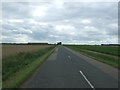 Looking south east on the B1093 in PE15 0HQ