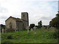 Graves in the churchyard of All Saints Church in NR13 6NL