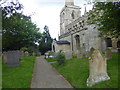 Path to the south porch, St Martin's Church, Ancaster in NG32 3PU