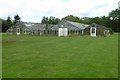 Dilapidated glasshouses in DY7 5ER