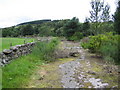 Remains of the road leading to the  bridge (now removed) over the Water of Feugh in AB31 6PG