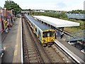 Liverpool train at Birkenhead North station in CH41 7AZ
