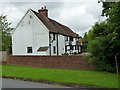 The west frontage and north gable of The Templars in CV7 7AE