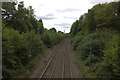 Railway looking south from footbridge out of Sailors Grove in SG13 8NR