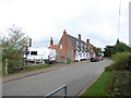 Carbrooke: houses opposite the church in Carbrooke