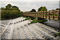 A weir and footbridge at Barrow-upon-Soar in LE12 8LJ