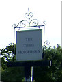 Sign for the Three Horseshoes public house, Roydon in PE32 1AT