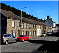 Row of houses on the north side of Clydach Road, Clydach Vale in CF40 2DG