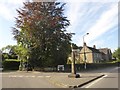 Stone pillar with signpost and light, Rowsley in Rowsley