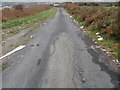 Litter-strewn lane, Heol Las, Penyrheol in CF83 2NJ