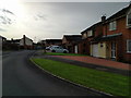 Houses and parked cars, Culm Lea in EX15 1NJ