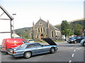 A busy crossroads at the centre of Dolwyddelan in LL25 0EQ