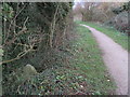 Footpath, former tramway, and boundary stone in CH6 5RS