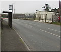 Bus stop and shelter at the southern edge of Penrhiwfer in CF40 1NY