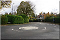 Mini roundabout in Hale Barns in WA15 0PA