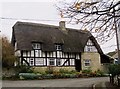 A thatched house on Manor Road in OX1 5AA