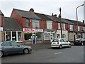 Shops and homes on Owston Road, Carcroft in DN6 8DB