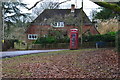 Former telephone box and cottage in SO43 7GH
