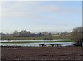 Southend Farm viewed over flooded fields in WR8 0NE