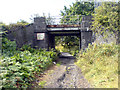 Rail bridge over footpath in NG20 9PE