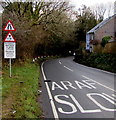Warning signs alongside the B4316 Station Road near Pentlepoir in SA69 9NQ