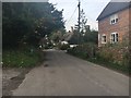 Road leading up past Royal Oak pub in Wootton Rivers