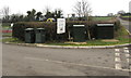 Two telecoms cabinets and two litter bins, Shirenewton in Shirenewton