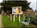Bench and church noticeboard, Fulbrook, West Oxfordshire in Fulbrook