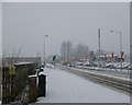 Snow on  Hamilton Road, Motherwell in ML1 3AZ