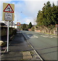 Warning sign - skid risk for half a mile, Cefn-y-bedd, Flintshire in LL12 9BQ