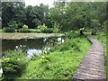 Parceval Hall gardens, lake and boardwalk in BD23 6DE