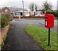 Queen Elizabeth II postbox on a corner in Cefn-y-bedd, Flintshire in LL12 9DH