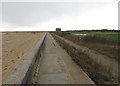 Sea wall footpath looking south-west from Clacton-on-Sea in CO15 1XR
