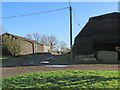 Wentworth: weatherboarded barns at Manor Farm in CB6 2FX
