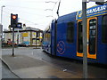 Tram turns from City Road into Park Grange Road in S2 1GH