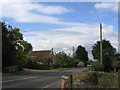 The A361 and part of Manor Farm, Piltown in BA6 8NG
