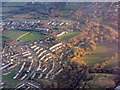 Woodland and housing estates in CM19 4EH